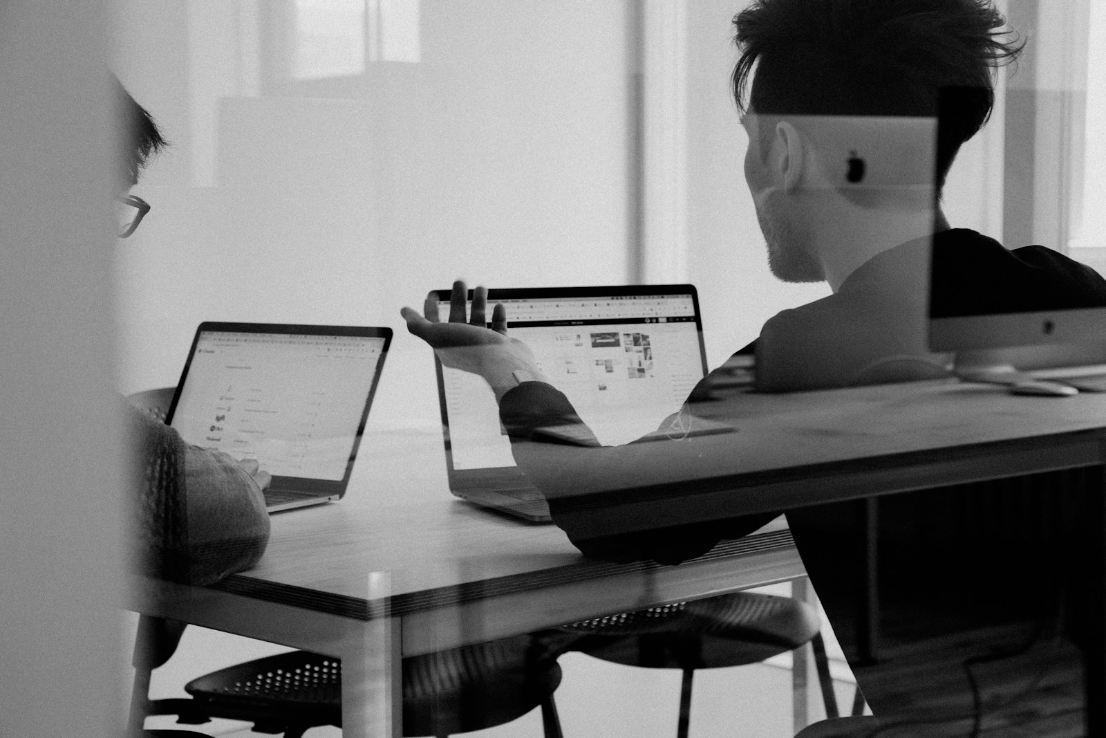 Customer support agent with headset at a computer