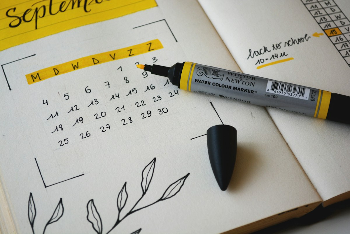 Calendar and scheduling on a laptop screen.